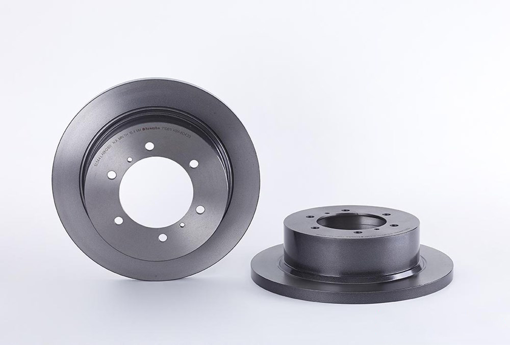 BREMBO Brake disc solid 08.7106.11 Brake rotor,Brake discs MITSUBISHI,PAJERO II (V3_W, V2_W, V4_W),Pajero Sport I SUV (K7_, K9_)