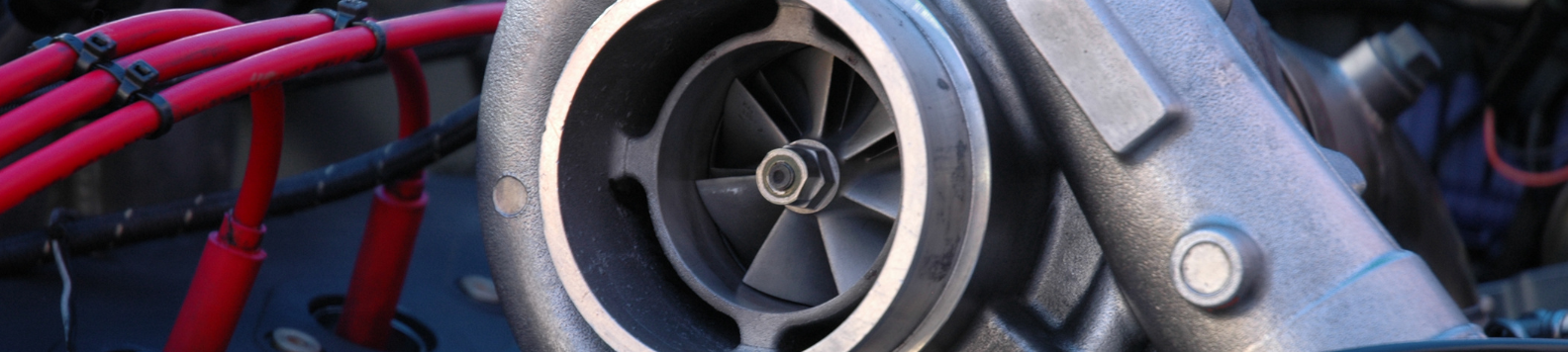 Het slakkenhuis van een turbocharger, met de turbine zichtbaar